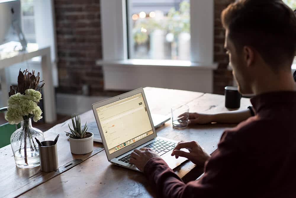 Person working on laptop at home